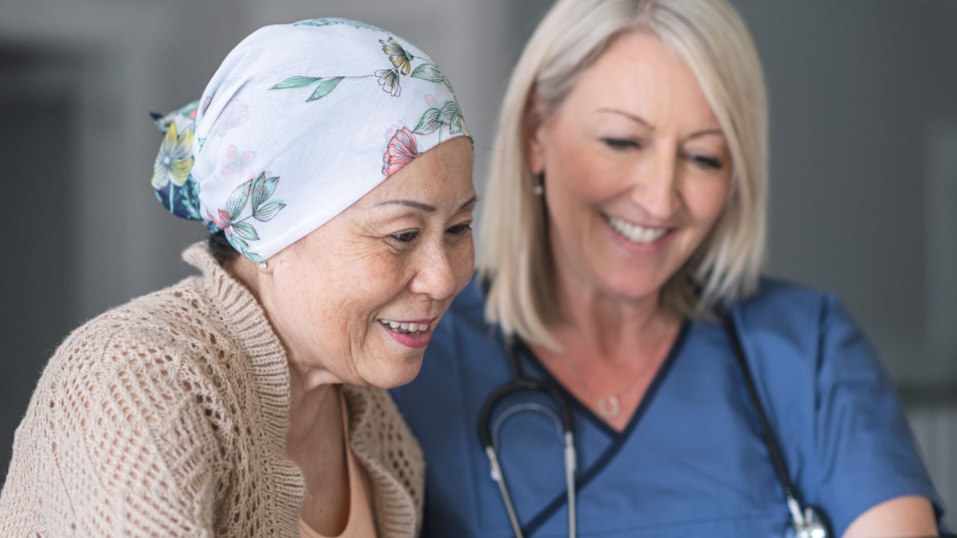 Lady wearing headscarf with a nurse