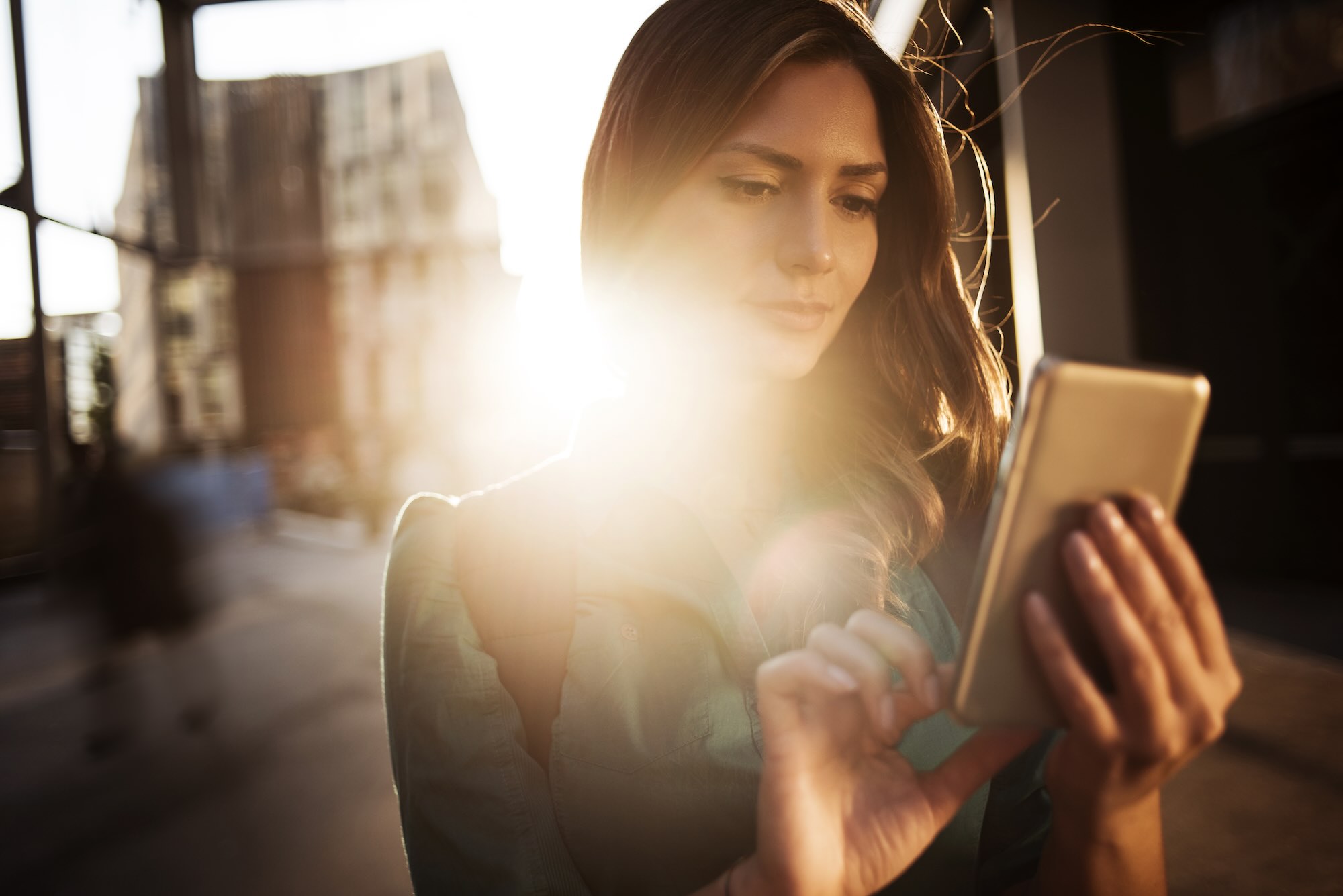 girl on mobile phone considering her cra career options for clinical researchers